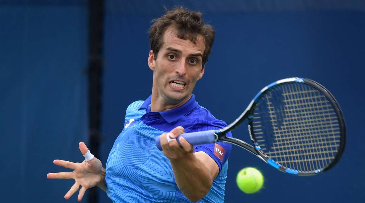 Ramos batalla para vencer a Pouille en el US Open